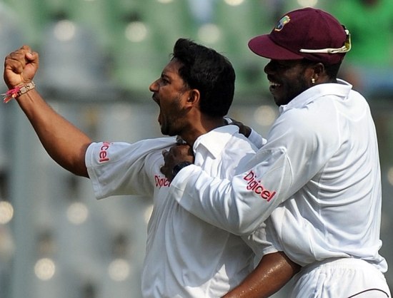 Ravi Rampaul celebrates Sachin Tendulkar's wicket