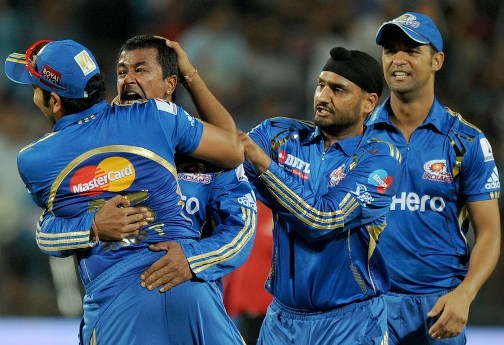 Pragyan Ojha congratulated by teammates Pragyan Ojha congratulated by teammates