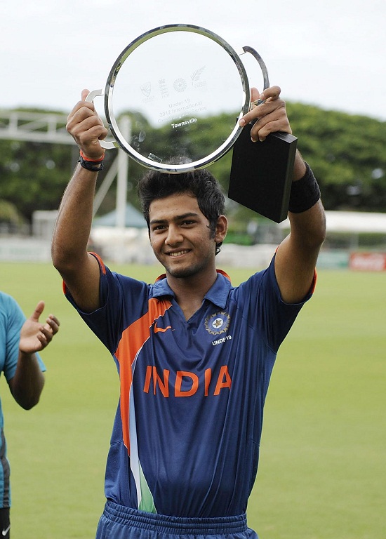 Unmukt Chand with trophy