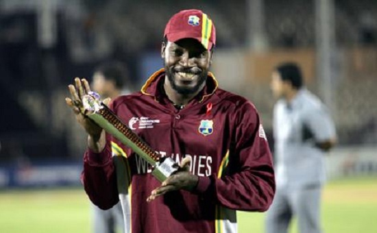 Gayle with man of the match trophy