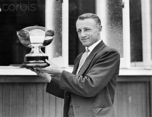 Don Bradman Holding Trophy