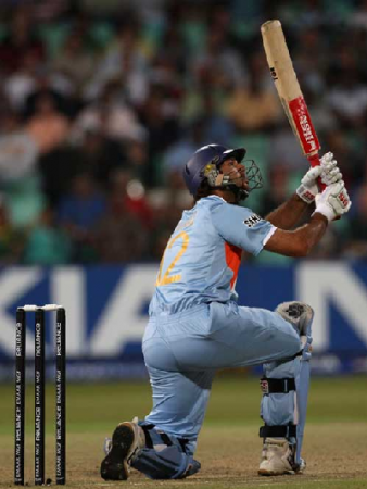 Yuvi bent down on his knee to hit the ball over mid wicket boundary for his 5th SIX