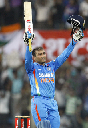 Virender Sehwag celebrates his record-breaking double-hundred